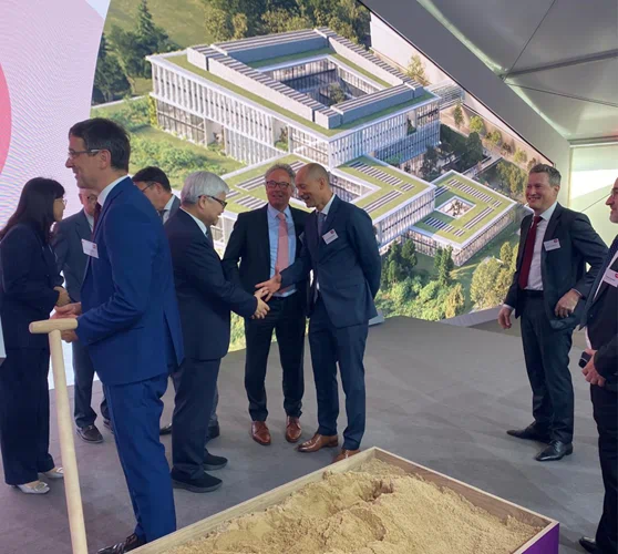 a group of people standing in front of a building