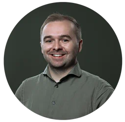 Portrait of man smiling with green pique shirt